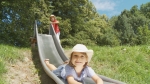 girl and boy sliding